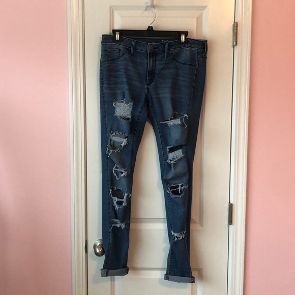 ripped blue jeans - Picture 1 of 1